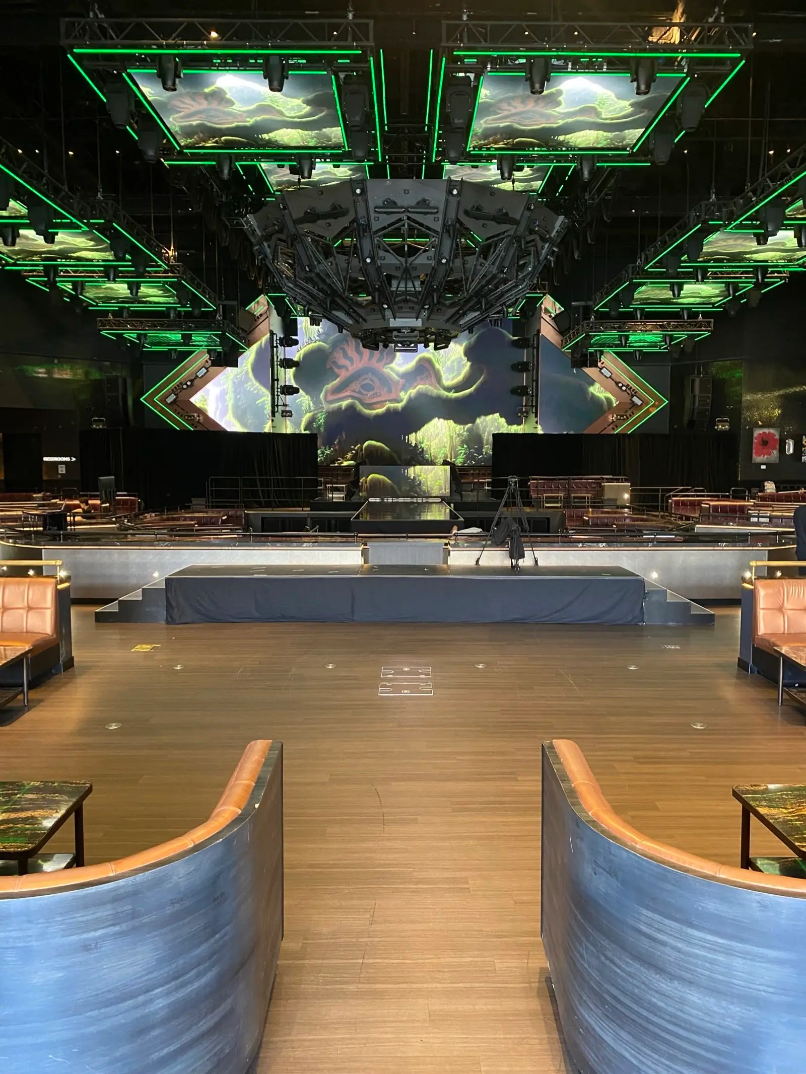 Concert stage with dramatic green lighting