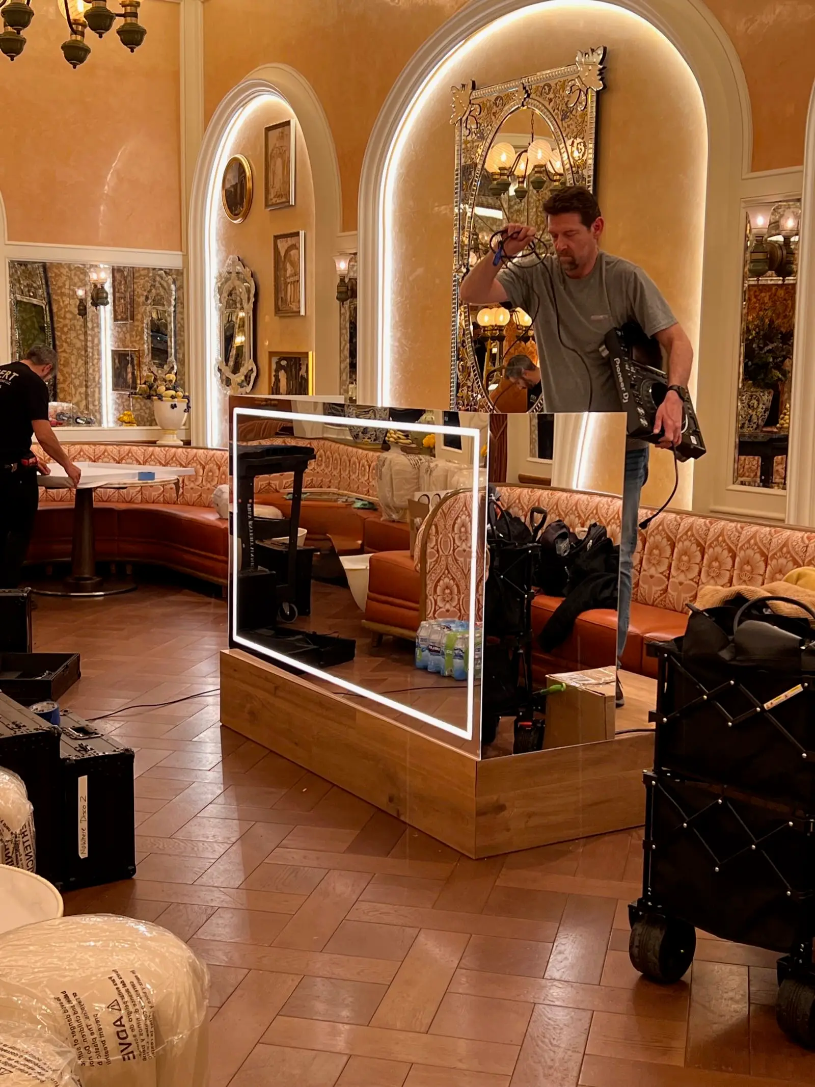 Crew member with equipment at luxury venue